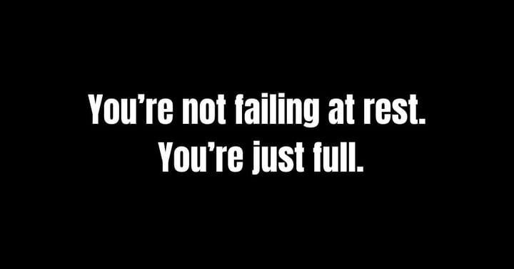 White text on a black background: “You’re not failing at rest. You’re just full.” A quote introducing a blog post about overthinking at night and the pressure to force calm.